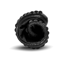 Load image into Gallery viewer, Rolled black leather with a textured surface, highlighting flexibility and comfort for leguano's Neron model.